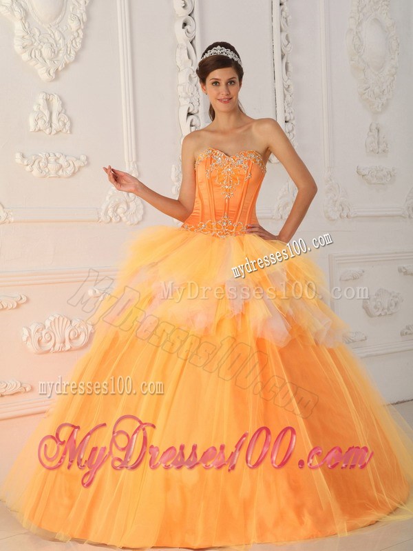 Orange A-line Appliques Decorate Quinceanera Dresses with Ruche and Layers