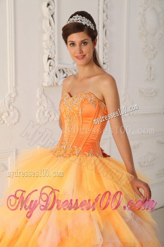 Orange A-line Appliques Decorate Quinceanera Dresses with Ruche and Layers