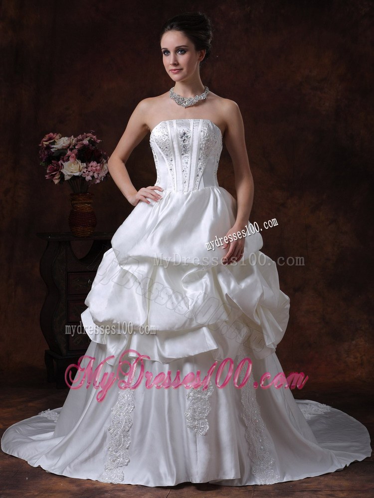 Beautiful Ruffles Court Train Bridal Dress with Appliques and Beadings
