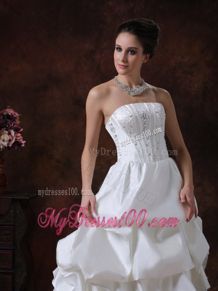 Beautiful Ruffles Court Train Bridal Dress with Appliques and Beadings