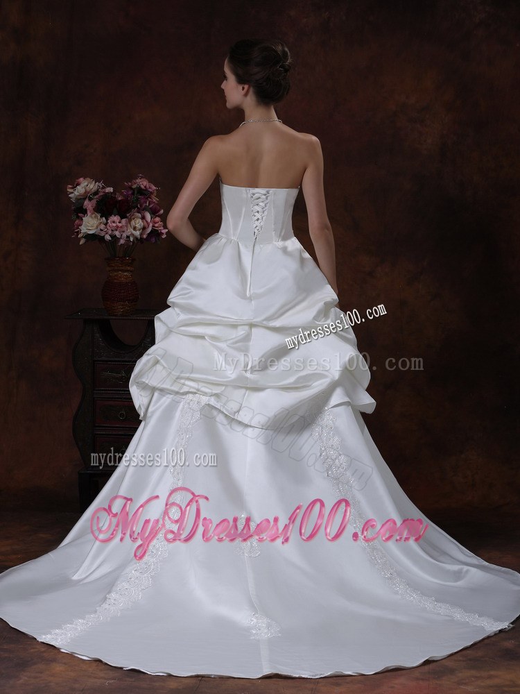 Beautiful Ruffles Court Train Bridal Dress with Appliques and Beadings