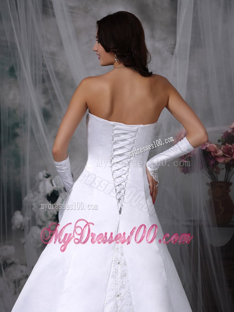 Embroidered A-line Court Train Wedding Dresses in White Satin
