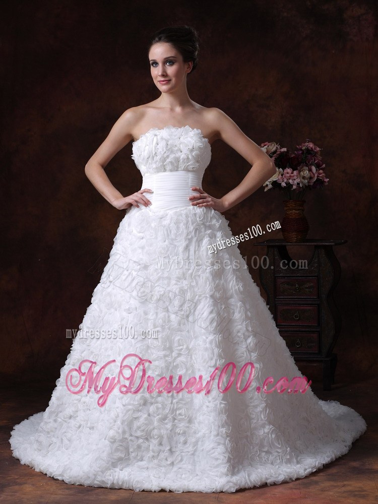 Rolling Flowers Decorate Strapless A-line Chapel Train Wedding Gown in White