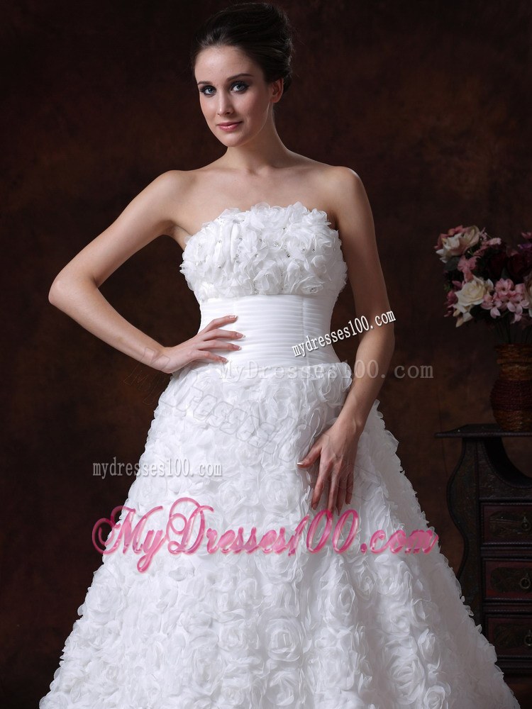 Rolling Flowers Decorate Strapless A-line Chapel Train Wedding Gown in White