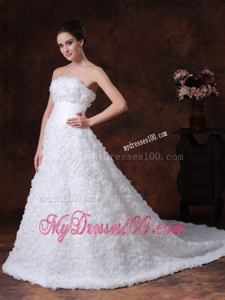 Rolling Flowers Decorate Strapless A-line Chapel Train Wedding Gown in White
