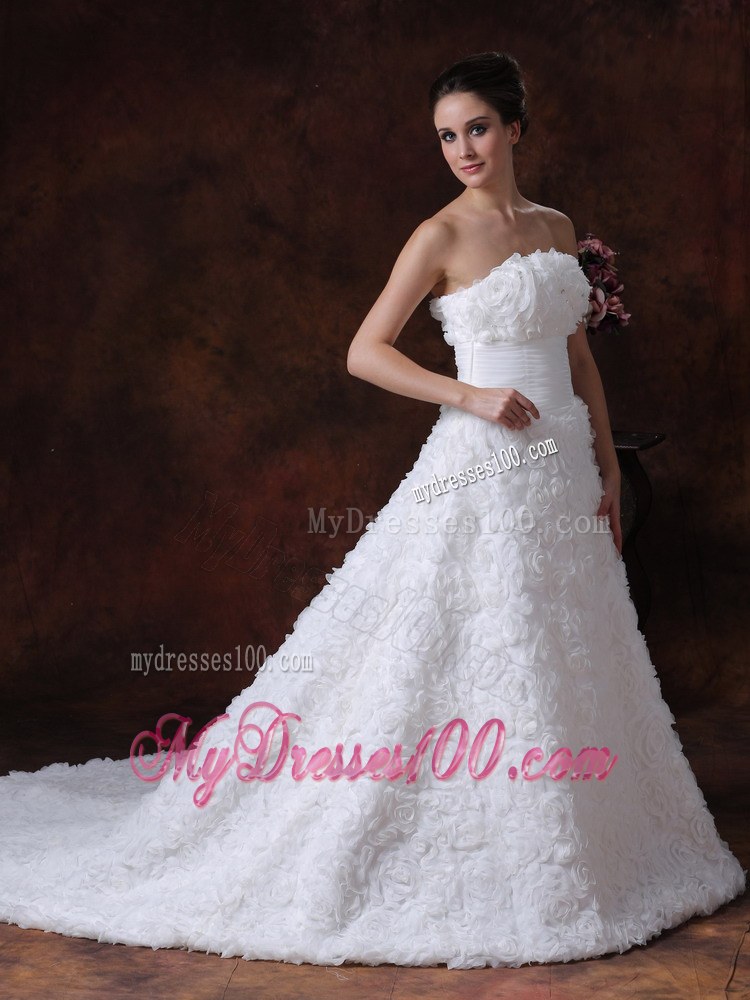 Rolling Flowers Decorate Strapless A-line Chapel Train Wedding Gown in White