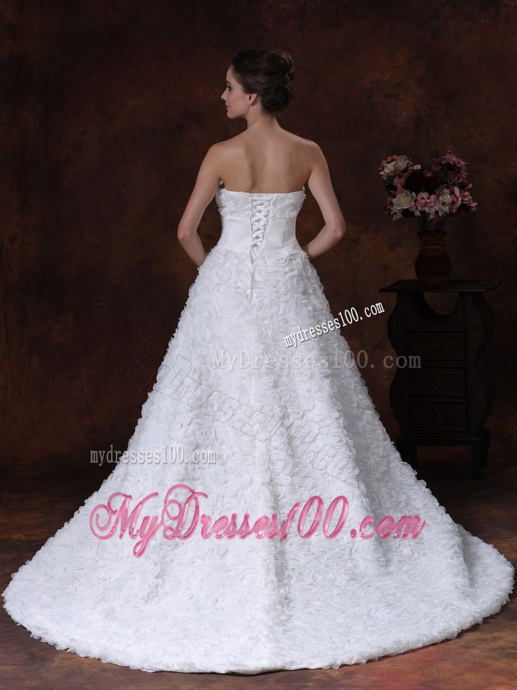 Rolling Flowers Decorate Strapless A-line Chapel Train Wedding Gown in White