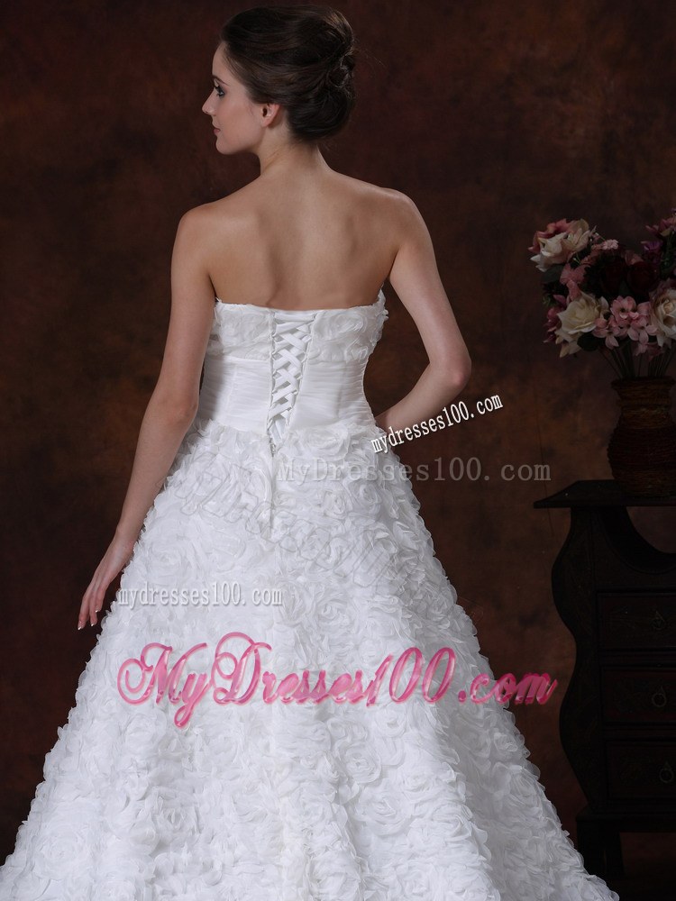 Rolling Flowers Decorate Strapless A-line Chapel Train Wedding Gown in White