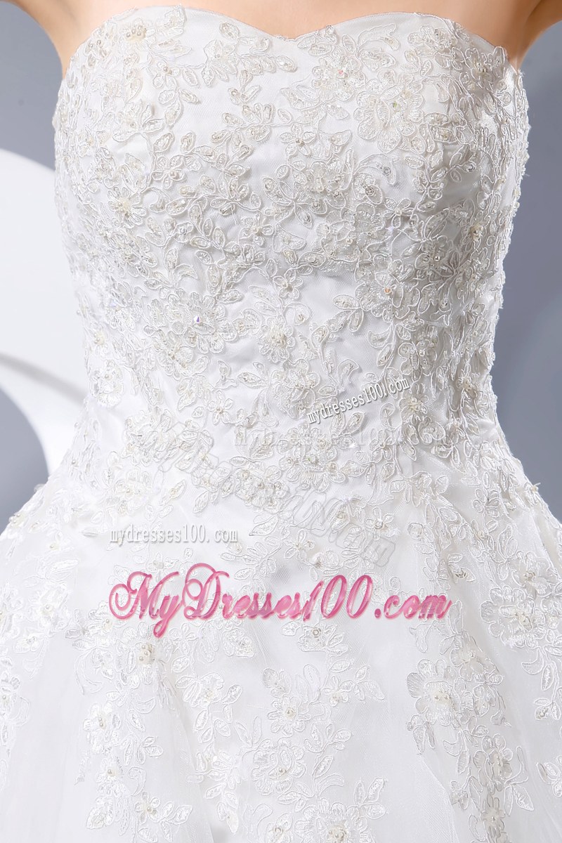 Diamonds and Floral Appliques Decorated Bridal Gowns with Brush Train