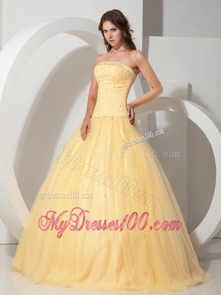 Light Yellow Strapless Beaded Quinceanera Dress with Lace-up