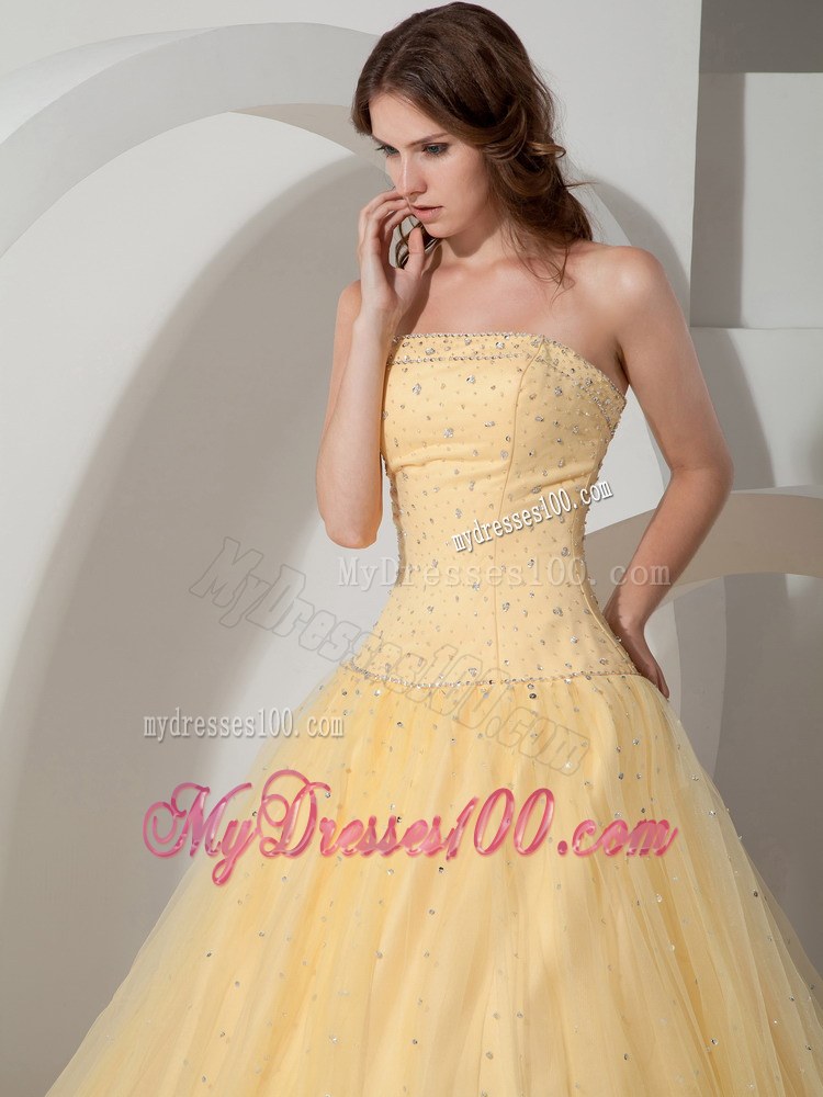 Light Yellow Strapless Beaded Quinceanera Dress with Lace-up