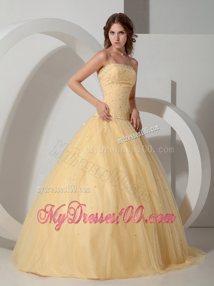 Light Yellow Strapless Beaded Quinceanera Dress with Lace-up