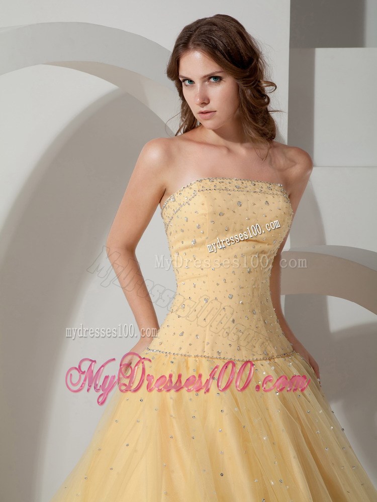 Light Yellow Strapless Beaded Quinceanera Dress with Lace-up
