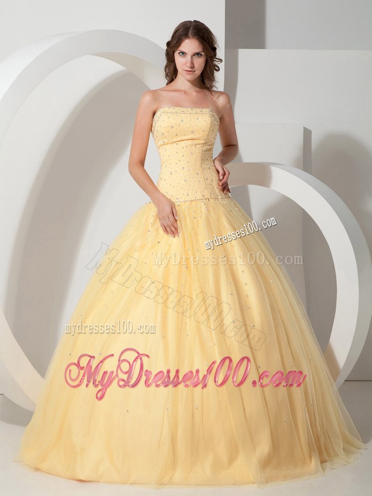 Light Yellow Strapless Beaded Quinceanera Dress with Lace-up