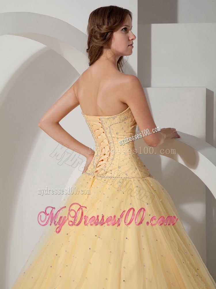 Light Yellow Strapless Beaded Quinceanera Dress with Lace-up