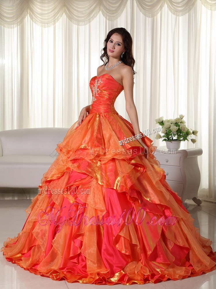 Ruched Orange Quinceanera Gown with Appliques and Ruffled Layers