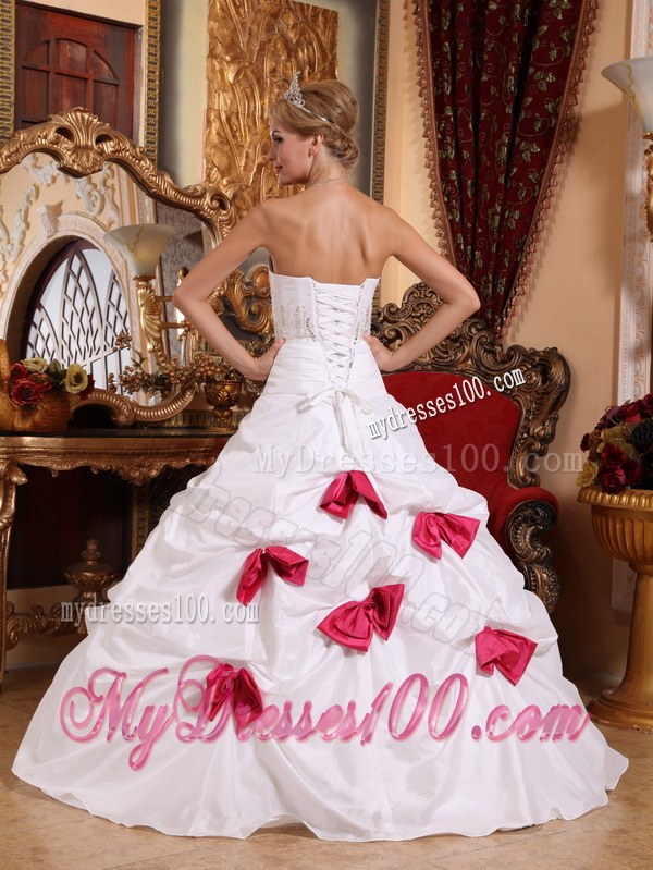 White A-line Quinceanera Dress with Beading and Bowknots