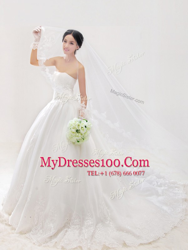 Fine Strapless Sleeveless Wedding Gown With Train Chapel Train Lace and Appliques White Organza
