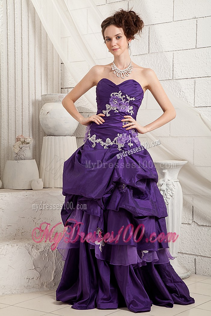 Appliques and Ruffled Layers Decorate on Purple Prom Gown