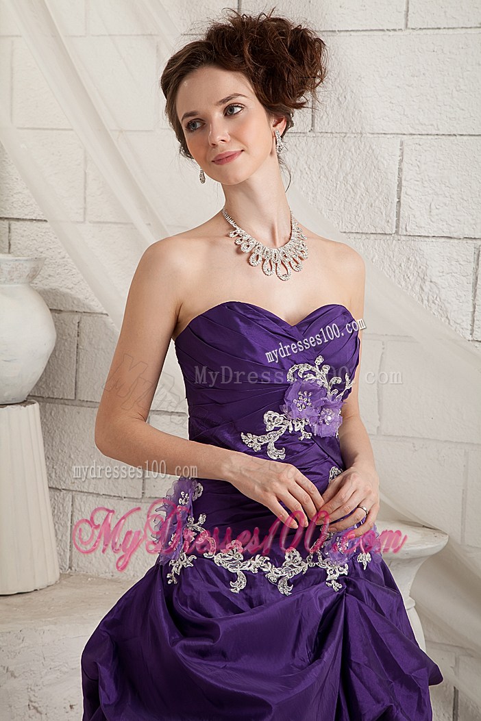 Appliques and Ruffled Layers Decorate on Purple Prom Gown
