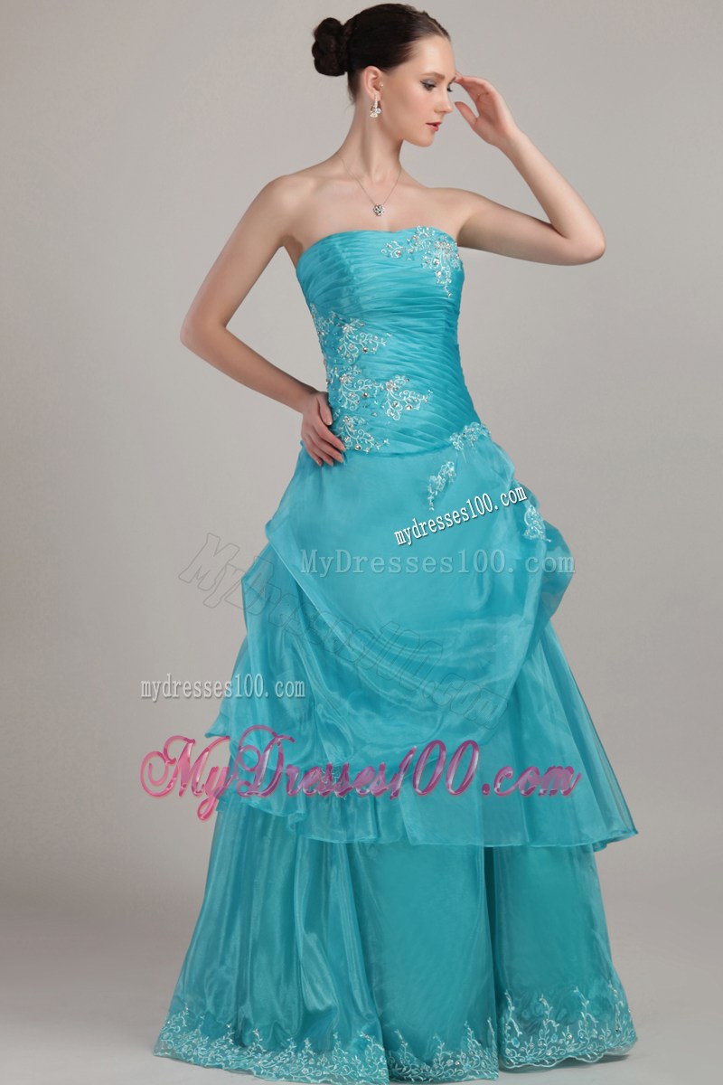 Turquoise Prom Gown with Pick-ups and Appliqued Hemline