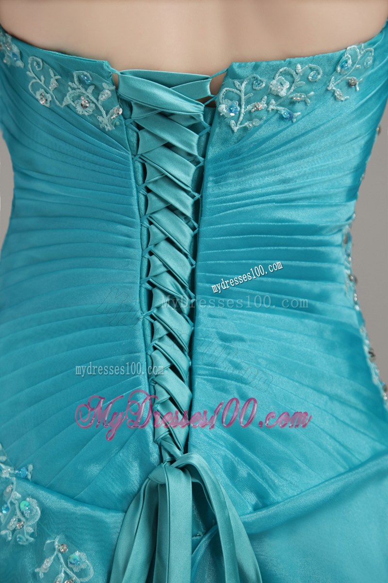 Turquoise Prom Gown with Pick-ups and Appliqued Hemline
